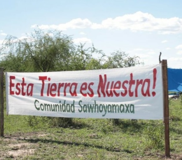 Rótulo de Esta tierra es nuestra